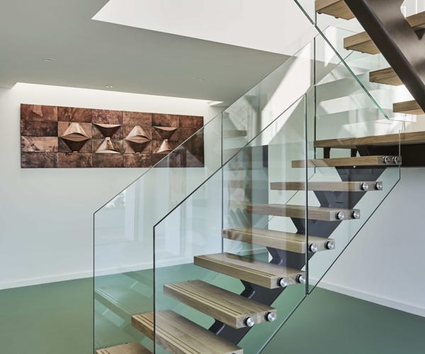Modern staircase inside Cliff Self Sufficient Beach House