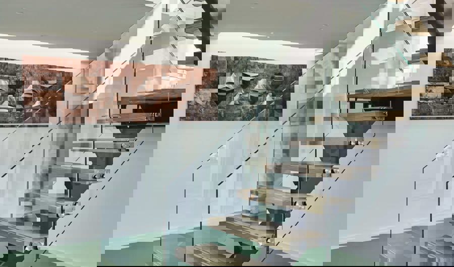 Modern staircase inside Cliff Self Sufficient Beach House