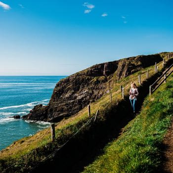 Guest walking the Cliff Walk in Ardmore