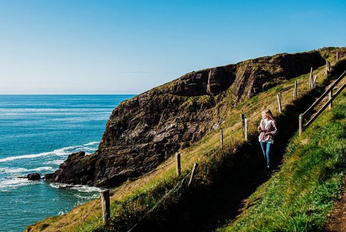 Guest walking the Cliff Walk in Ardmore