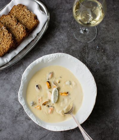 Pour into serving bowl and garnish with herbs at Cliff House Hotel