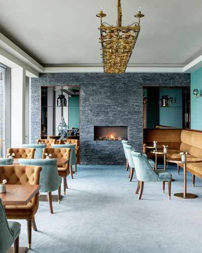 Dining Lounge with fireplace at Cliff House Hotel Ardmore