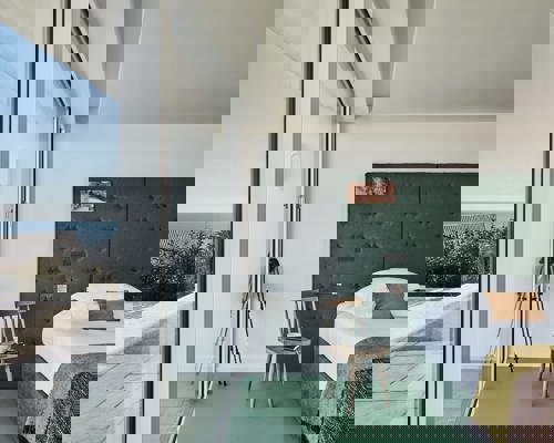 Sea-view bedroom at Cliff Beach House