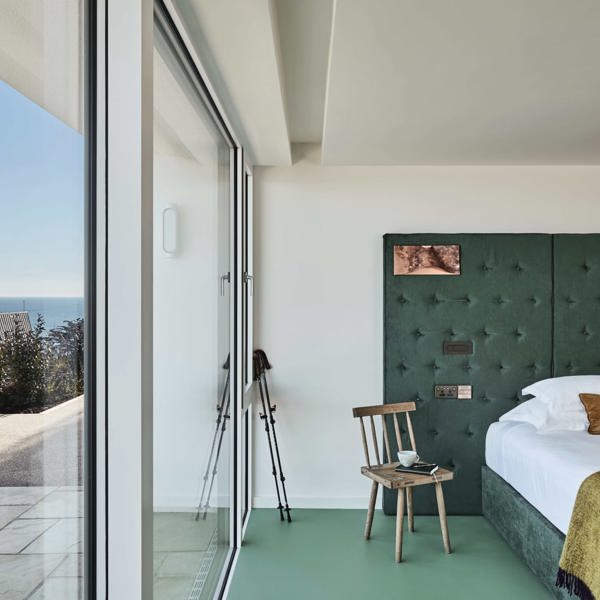 Sea-view bedroom at Cliff Beach House