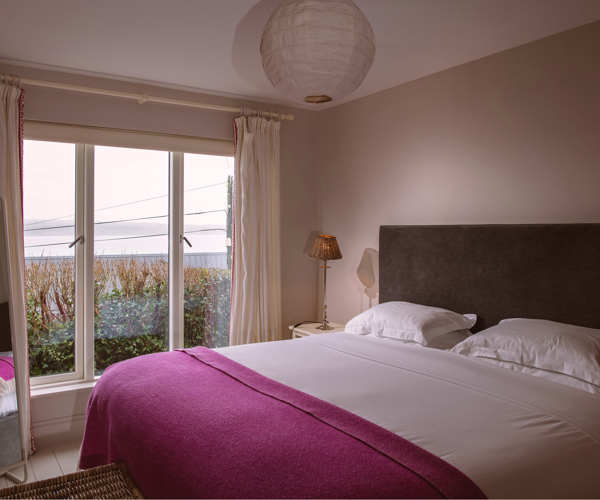 Bedroom with sea view at Cliff Cottage in Ardmore