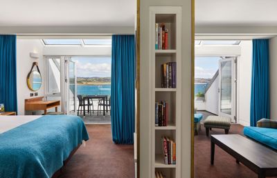 Warm suites bathed in sunlight at Cliff House Hotel
