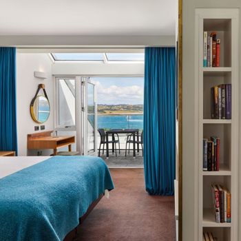 Warm suites bathed in sunlight at Cliff House Hotel