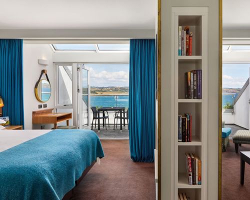 Warm suites bathed in sunlight at Cliff House Hotel