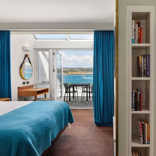 Warm suites bathed in sunlight at Cliff House Hotel
