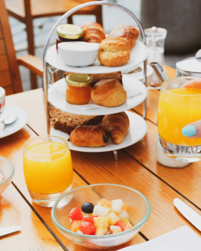 Breakfast pastries, fruit and juice at Cliff House Hotel